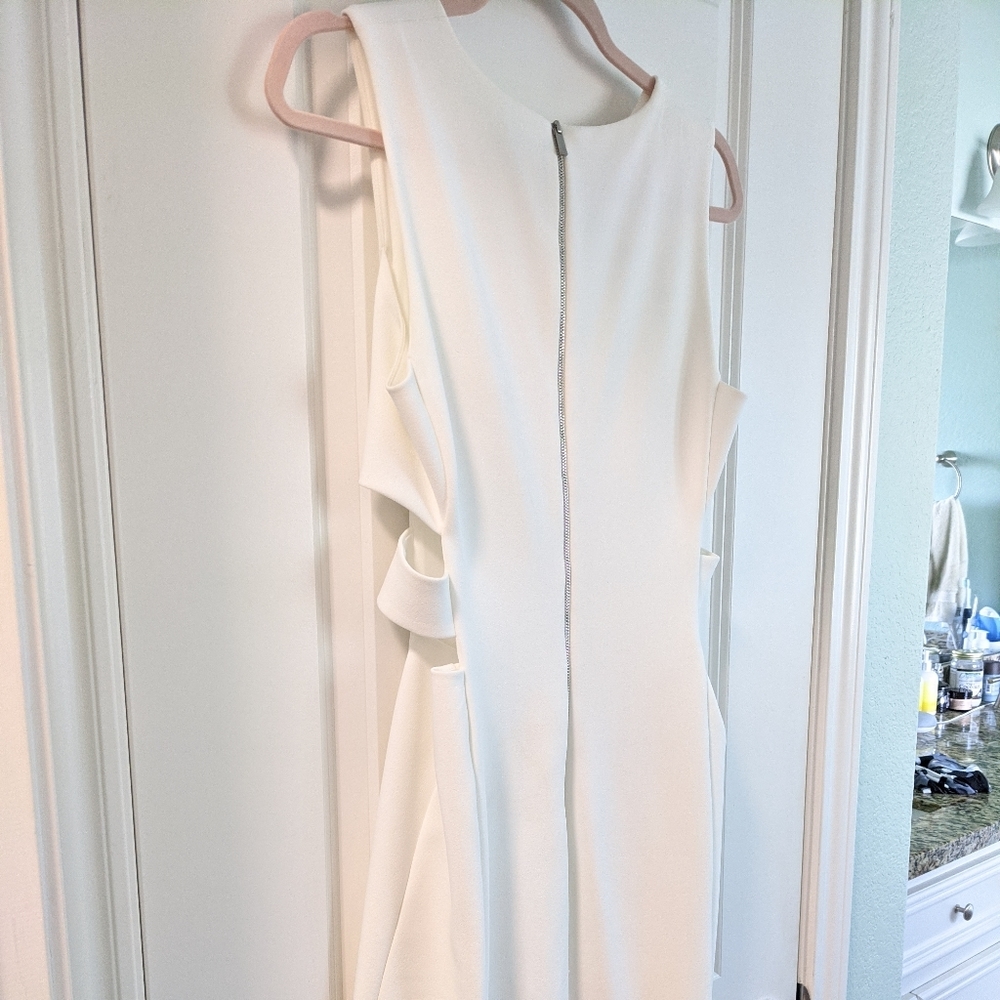 White dress with side cut outs size 4